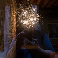 ss_self-portrait_reflecting_on_venetian_glass